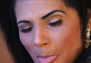 Big-breasted lady in stockings lets him eat it