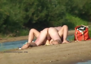 Awesome nudist beach action with a pretty sweet mature